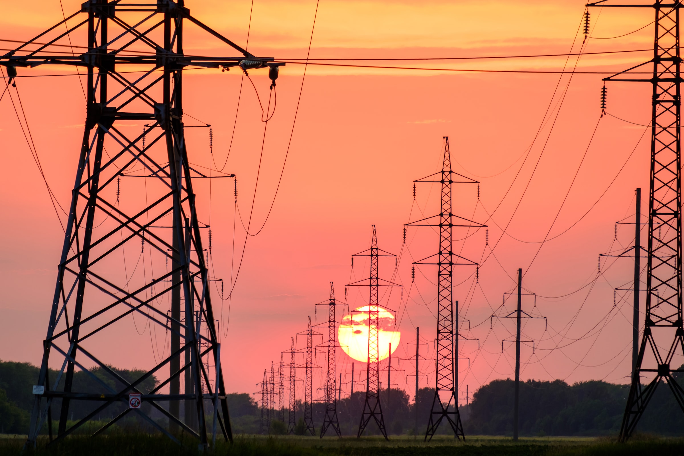 Sunrise with high voltage power lines
